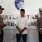 Foto: Permintaan maaf Harmadi usai lawan arus di exit tol Demak, sekaligus diberikan tilang oleh petugas Satlantas Polres Demak. (Dok. Ist) 