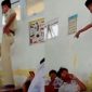 Tangkapan layar HP: Nampak seorang guru sedang memarahi siswa hingga melakukan dugaan penganiayaan.
