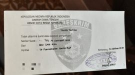 Surat tanda terima laporan polisi.