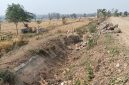Foto: Saluran irigasi, nampak kering.